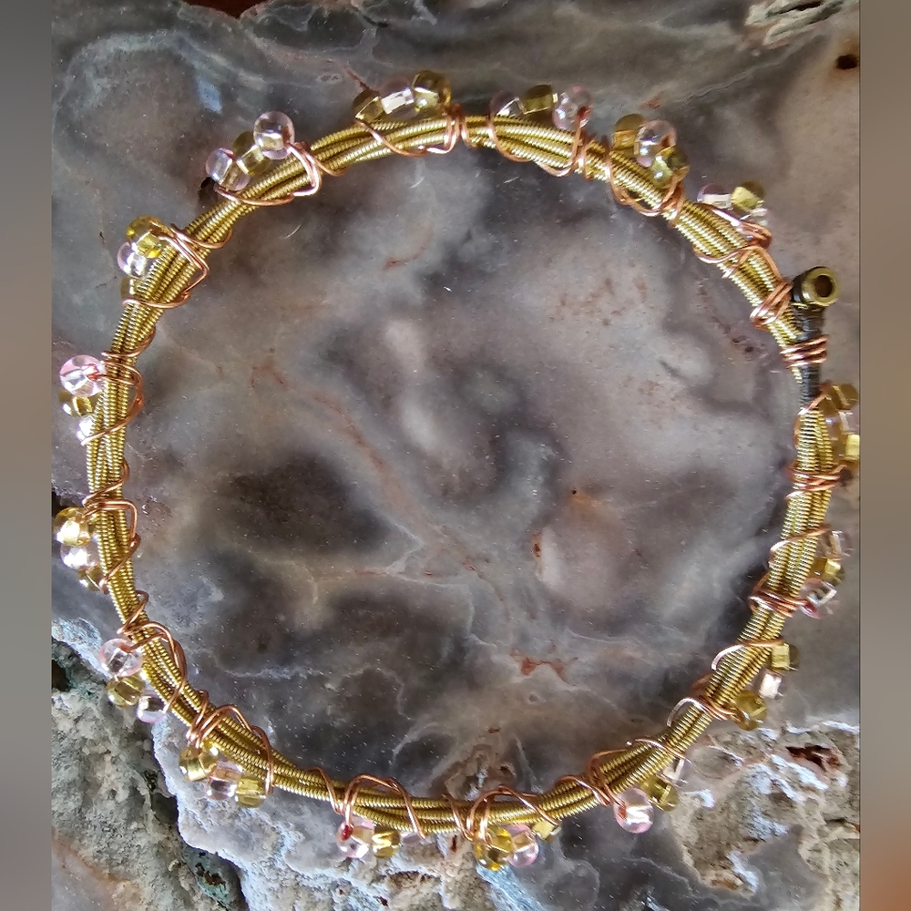 Elegant Gold and Pink Beaded Guitar String Bracelet